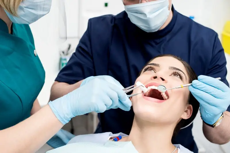 woman mouth open for dental examination