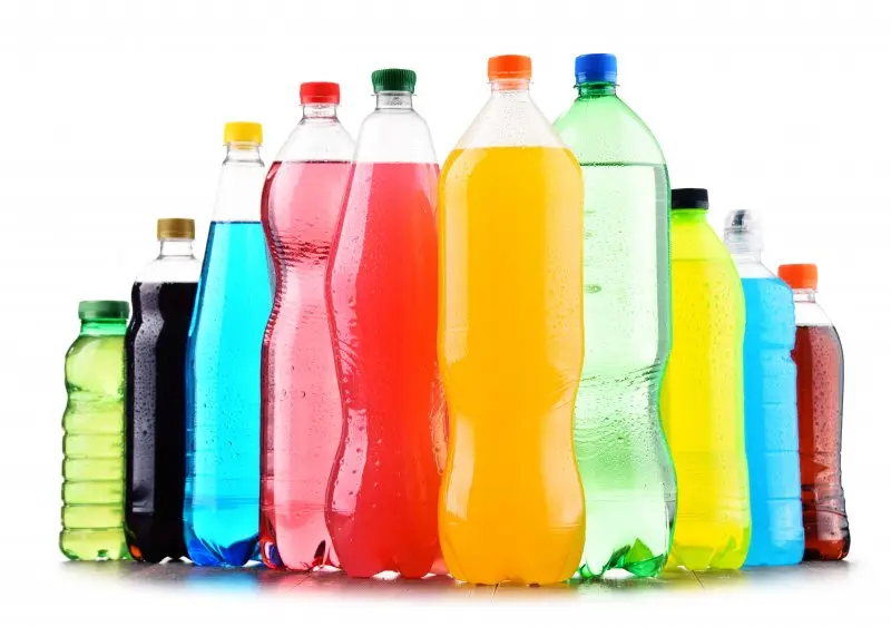 Row of colorful acidic beverages discouraged by your Colorado Springs dentist