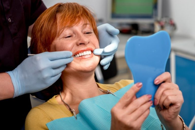 Woman Smiling at Dentist
